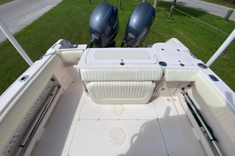 Slide: The Image of 2005 Grady-White Advance 257 boat interior with twin Yamaha 150 engines. - 31