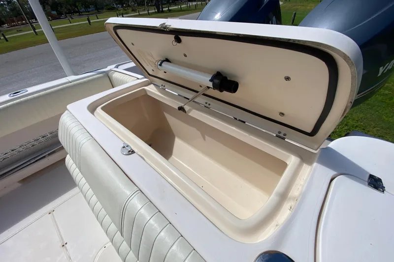 Slide: The Image of Open storage compartment on 2005 Grady-White Advance 257 boat, showcasing interior space. - 37