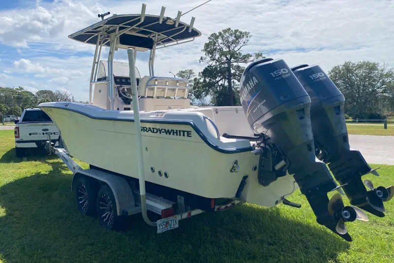 Slide: The Image of 2005 Grady-White Advance 257 boat with dual Yamaha engines on a trailer. - 6