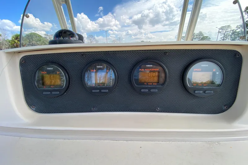 Slide: The Image of Dashboard of 2005 Grady-White Advance 257 boat with Yamaha gauges. - 63