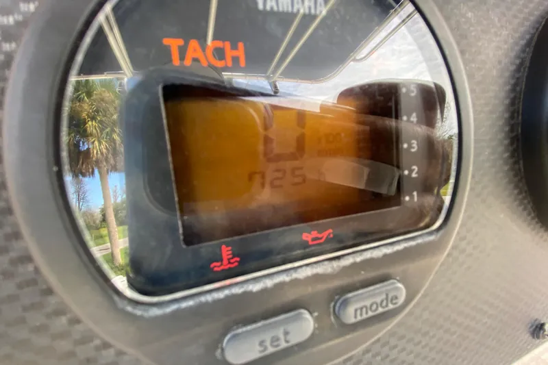 Slide: The Image of Close-up of a Yamaha tachometer on a 2005 Grady-White Advance 257 boat. - 64