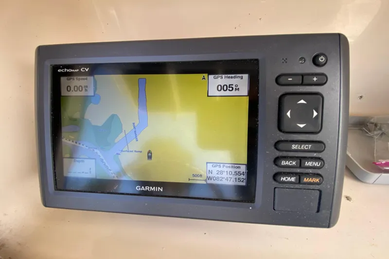 Slide: The Image of Garmin GPS device on 2005 Grady-White Advance 257 boat displaying navigation map. - 67