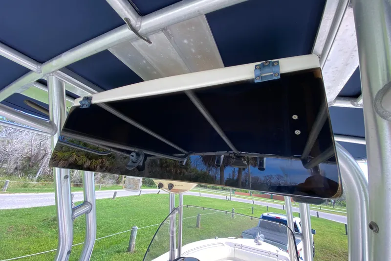 Slide: The Image of 2005 Grady-White Advance 257 boat with T-top and electronics box. - 73