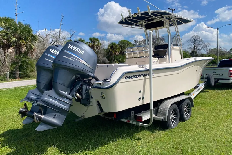 Slide: The Image of 2005 Grady-White Advance 257 boat with twin Yamaha engines on a trailer. - 8