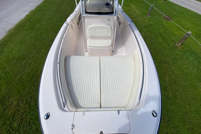 Slide: The Image of 2005 Grady-White Advance 257 boat interior with cushioned seating, viewed from above. - 90