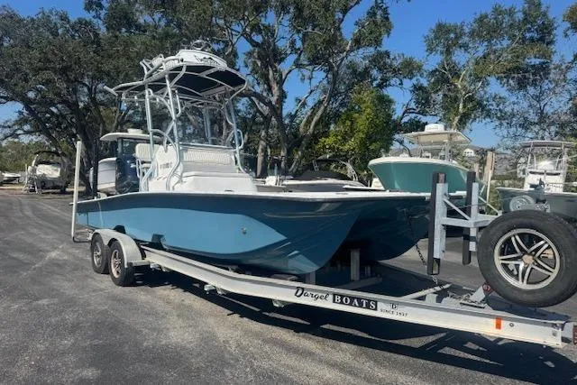 The Image of 2016 Dargel Kat 250 HDX boat on trailer, parked outdoors with trees in background. - 0