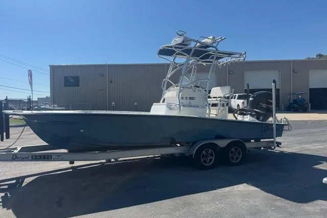 Slide: The Image of 2016 Dargel Kat 250 HDX boat on trailer, parked outside industrial building. - 4