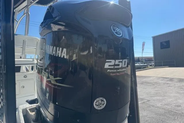 Slide: The Image of 2016 Dargel Kat 250 HDX with Yamaha 250 outboard motor in a sunny outdoor setting. - 6