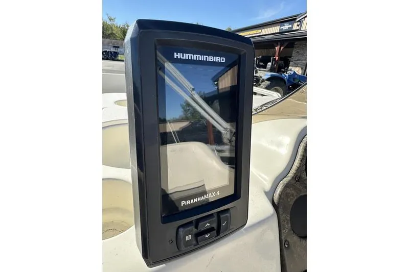 Slide: The Image of Humminbird PiranhaMAX 4 fish finder on 1997 Harris 240 boat dashboard. - 19