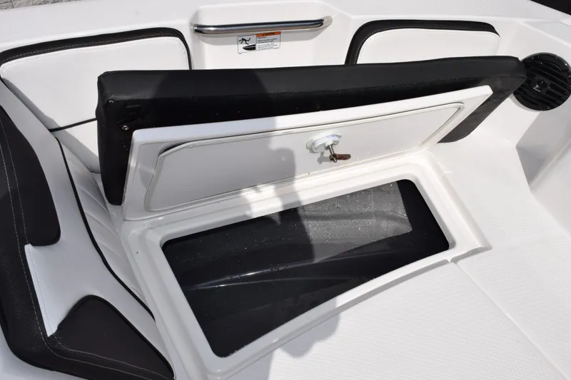 Slide: The Image of Open storage compartment on 2026 Yamaha Boats 222 FSH Sport E. - 18