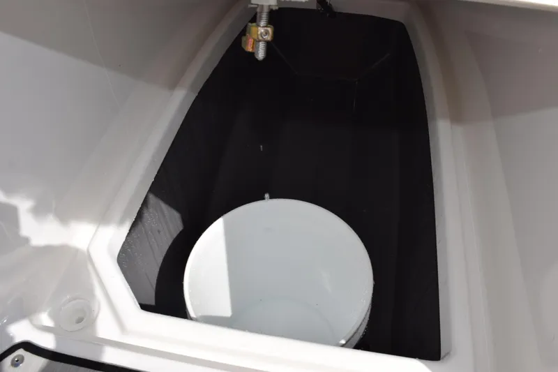 Slide: The Image of Storage compartment with bucket in 2026 Yamaha Boats 222 FSH Sport E. - 19