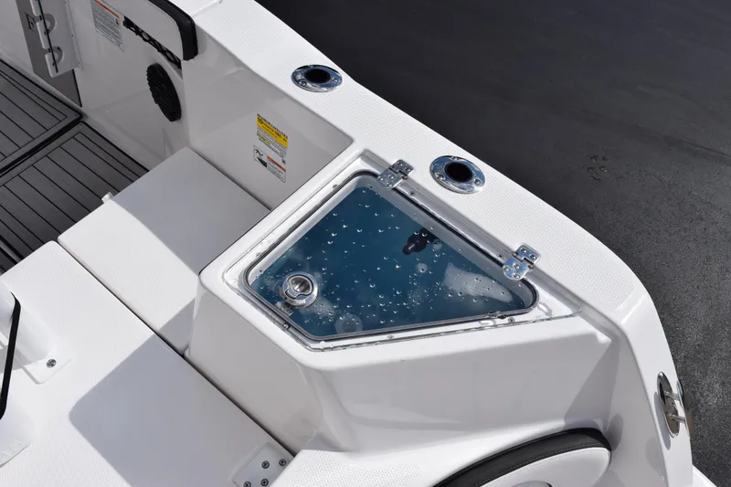 Slide: The Image of 2026 Yamaha Boats 222 FSH Sport E, featuring a sleek livewell with water droplets. - 9