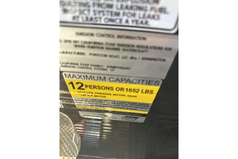 Slide: The Image of 2019 Bennington 22 SSRCX capacity label: 12 persons or 1652 lbs maximum. - 15