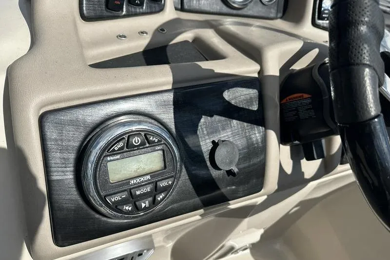 Slide: The Image of Control panel of a 2016 Bennington 2250 GSR boat with audio system. - 17