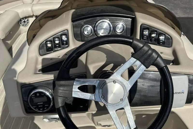 Slide: The Image of Steering console of 2016 Bennington 2250 GSR boat with gauges and controls. - 18