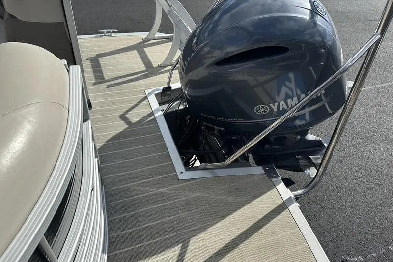 Slide: The Image of 2016 Bennington 2250 GSR pontoon boat with Yamaha outboard motor on deck. - 21
