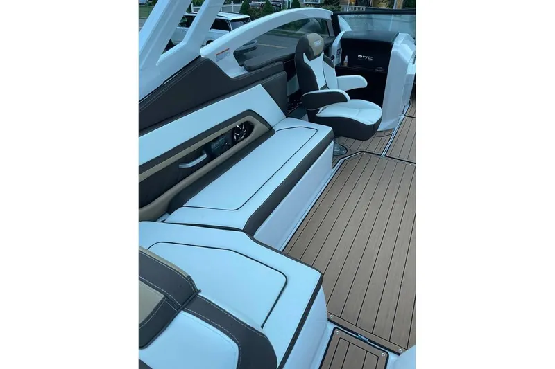 Slide: The Image of 2021 Yamaha Boats 275SD interior with sleek seating and modern design. - 10