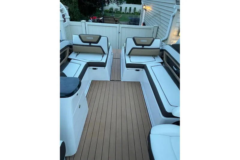 Slide: The Image of 2021 Yamaha Boats 275SD interior with sleek seating and modern design. - 8