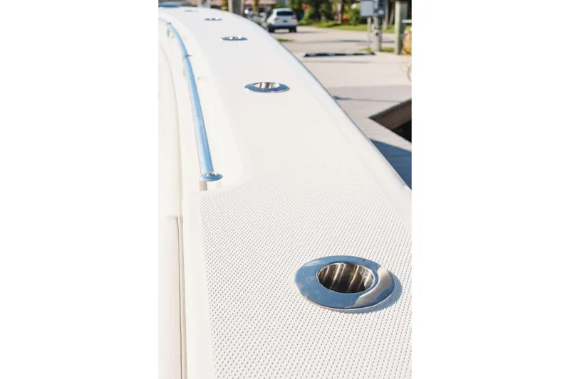 Slide: The Image of 2023 Invincible 36 Open Fisherman boat on open sea under blue sky. - 10