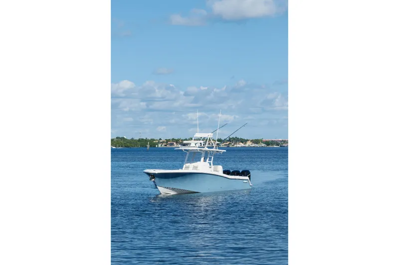 Slide: The Image of 2023 Invincible 36 Open Fisherman boat on open sea, front view. - 12