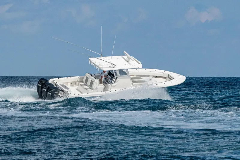 Slide: The Image of 2023 Invincible 36 Open Fisherman boat cruising on ocean waves. - 14