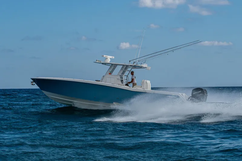 Slide: The Image of 2023 Invincible 36 Open Fisherman boat cruising on open water. - 15