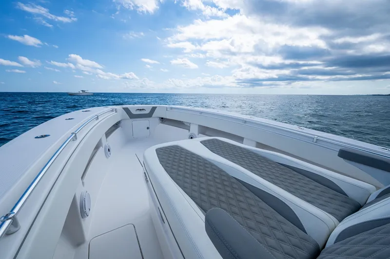 Slide: The Image of 2023 Invincible 36 Open Fisherman boat on open sea under cloudy sky. - 16