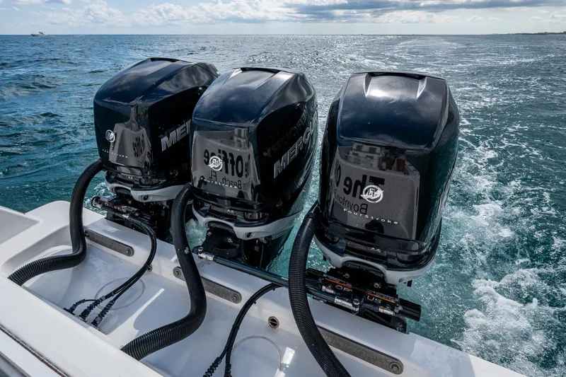 Slide: The Image of Triple Mercury outboard engines on 2023 Invincible 36 Open Fisherman boat. - 19