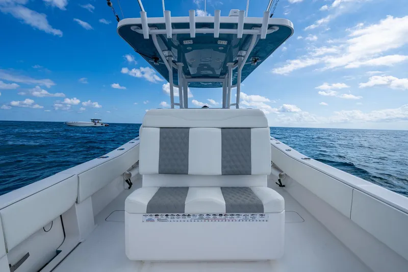 Slide: The Image of 2023 Invincible 36 Open Fisherman boat on open sea under blue sky. - 20