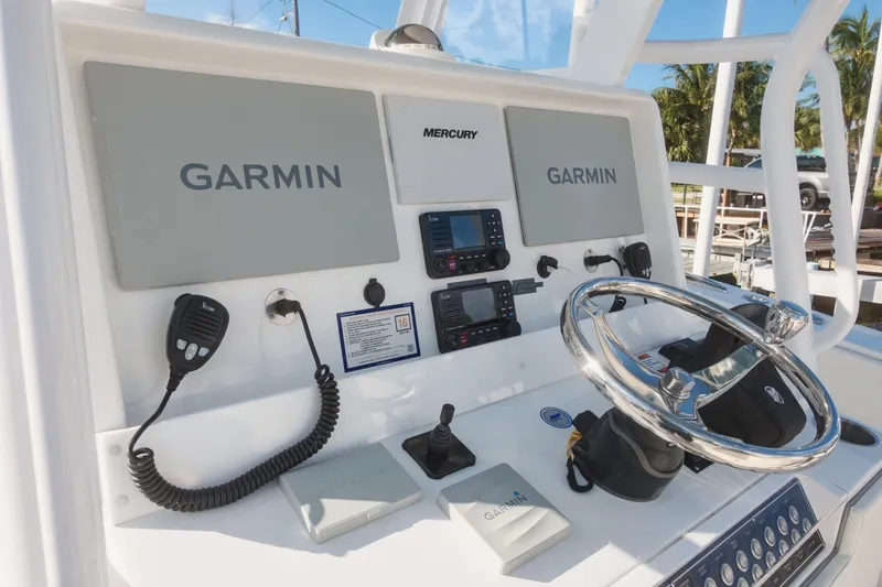 Slide: The Image of 2023 Invincible 36 Open Fisherman boat with four 400 horsepower engines on the ocean. - 3