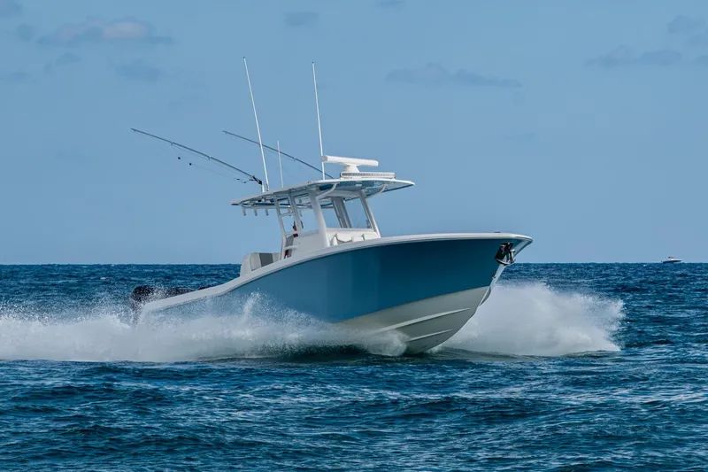 Slide: The Image of 2023 Invincible 36 Open Fisherman boat cruising on open water. - 37