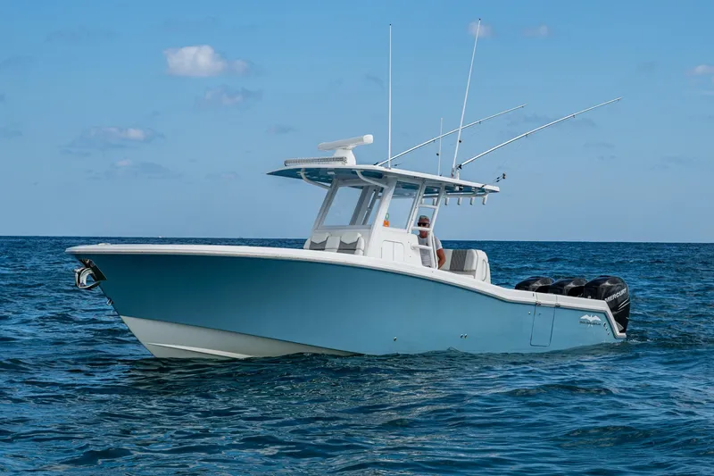 Slide: The Image of 2023 Invincible 36 Open Fisherman boat on open sea, clear sky background. - 39