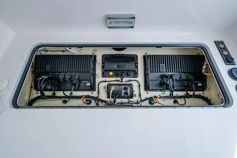 Slide: The Image of Electrical panel of 2023 Invincible 36 Open Fisherman boat, showcasing wiring and components. - 45