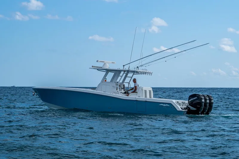 Slide: The Image of 2023 Invincible 36 Open Fisherman boat on open sea, clear sky background. - 46