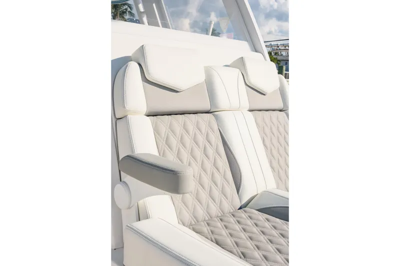 Slide: The Image of 2023 Invincible 36 Open Fisherman boat cruising on open ocean waters. - 5