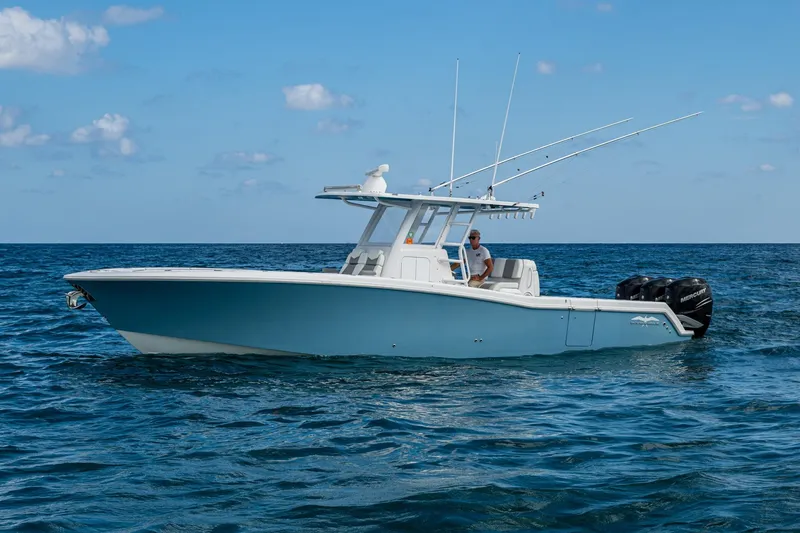 Slide: The Image of 2023 Invincible 36 Open Fisherman boat on open sea under blue sky. - 54