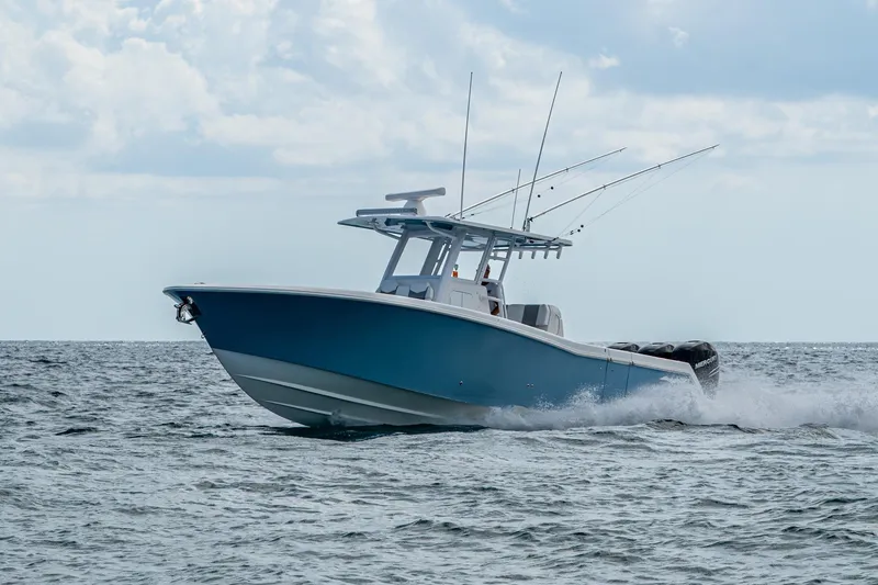 Slide: The Image of 2023 Invincible 36 Open Fisherman boat cruising on the ocean. - 57