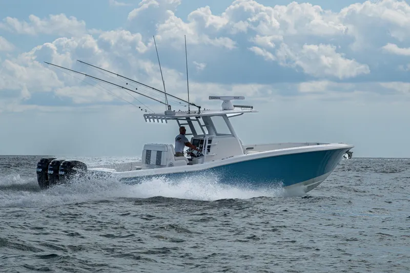 Slide: The Image of 2023 Invincible 36 Open Fisherman boat cruising on open water. - 60