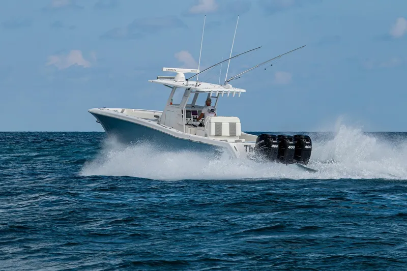 Slide: The Image of 2023 Invincible 36 Open Fisherman boat cruising on open water. - 64