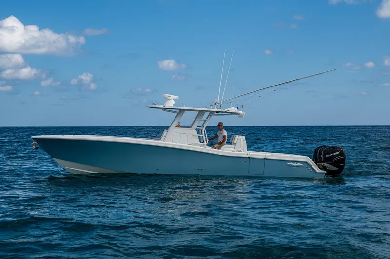 Slide: The Image of 2023 Invincible 36 Open Fisherman boat on open sea under blue sky. - 69