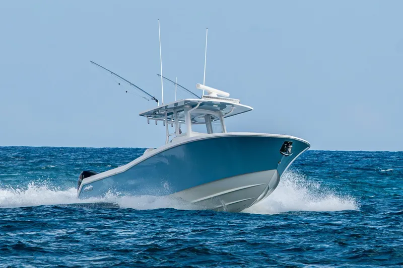 Slide: The Image of 2023 Invincible 36 Open Fisherman boat navigating ocean waves. - 70