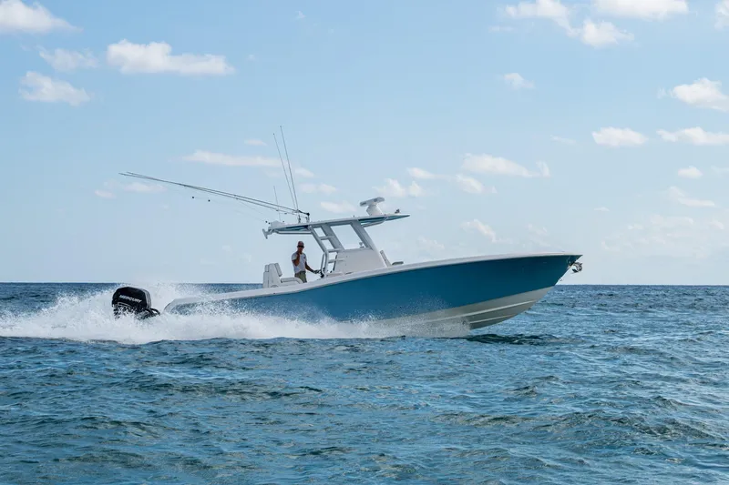 Slide: The Image of 2023 Invincible 36 Open Fisherman boat cruising on open water. - 76