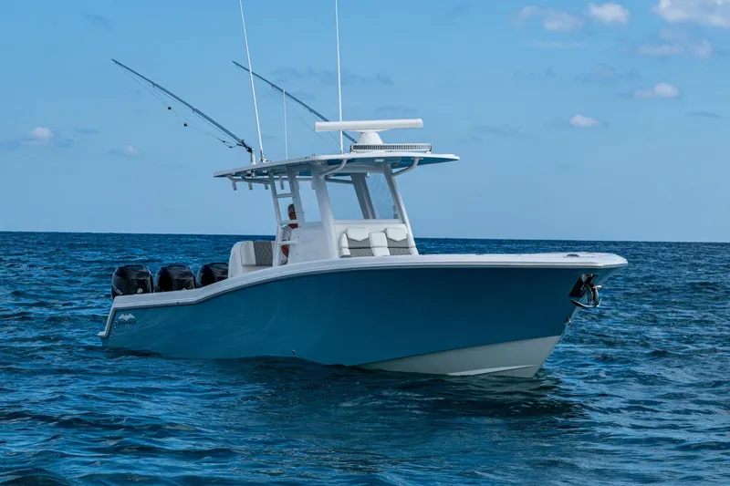 Slide: The Image of 2023 Invincible 36 Open Fisherman boat on open sea, clear sky background. - 80