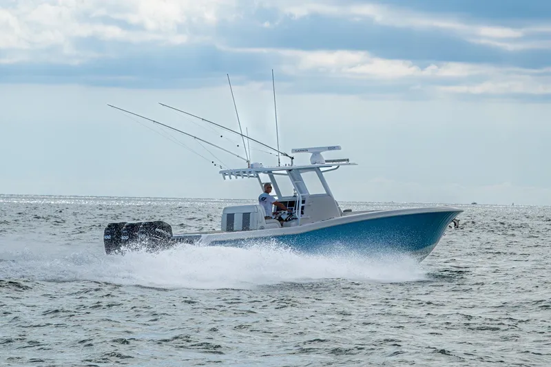 Slide: The Image of 2023 Invincible 36 Open Fisherman boat cruising on open water. - 82