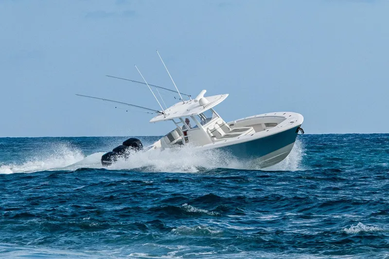 Slide: The Image of 2023 Invincible 36 Open Fisherman navigating ocean waves. - 84