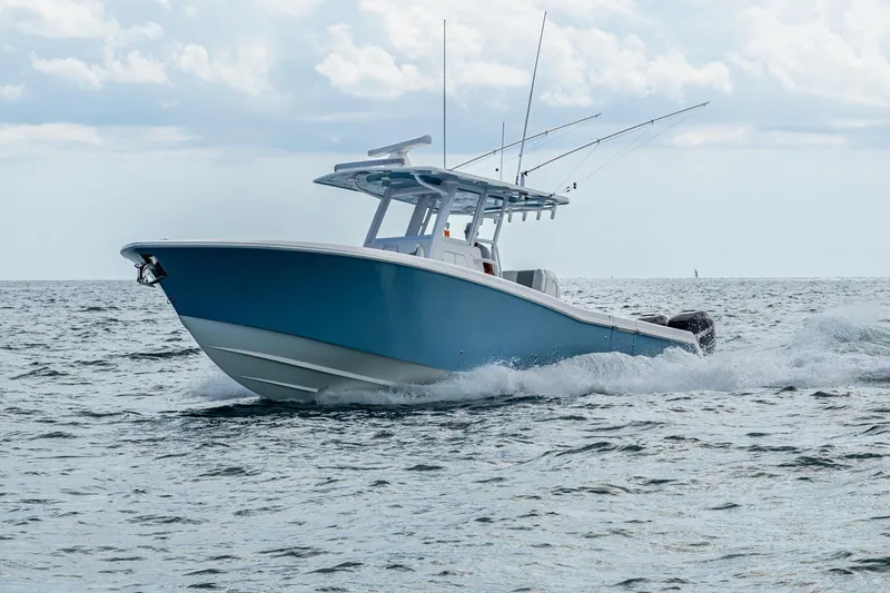 Slide: The Image of 2023 Invincible 36 Open Fisherman boat cruising on the ocean. - 86