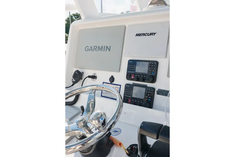 Slide: The Image of 2023 Invincible 36 Open Fisherman boat on calm waters under a cloudy sky. - 9