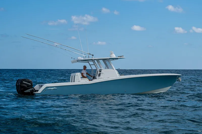 Slide: The Image of 2023 Invincible 36 Open Fisherman boat on open sea, clear sky background. - 90