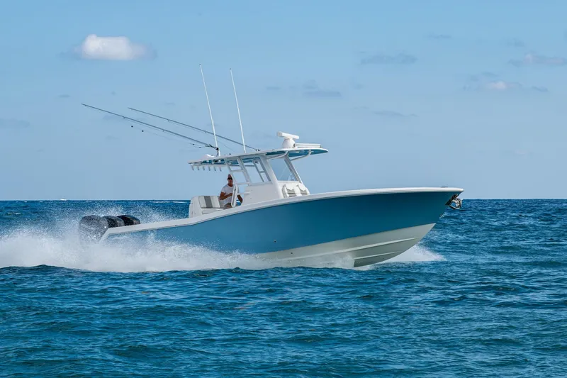 Slide: The Image of 2023 Invincible 36 Open Fisherman boat cruising on open sea. - 91