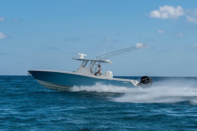 Slide: The Image of 2023 Invincible 36 Open Fisherman boat cruising on open water. - 93